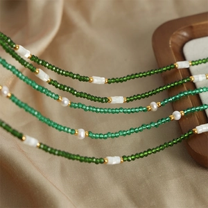 Emerald crystal beads and freshwater pearl handmade necklace with gold accents