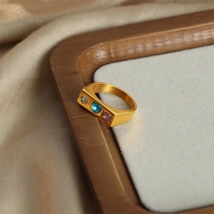 Gold plated stainless steel ring with blue heart, pink square and clear round gemstones