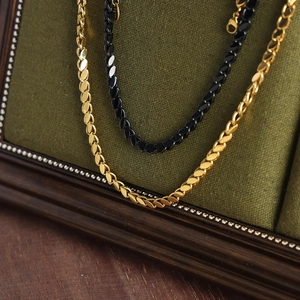 Hip hop titanium steel leaf-shaped link necklace in gold and black with lobster clasp