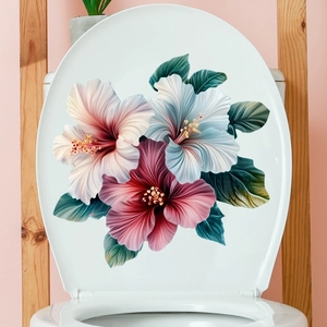 Floral toilet seat decal featuring hibiscus flowers and green leaves on a white cover