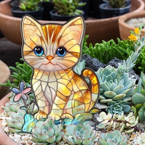 Cat garden stake with colorful mosaic pattern placed in a succulent planter pot