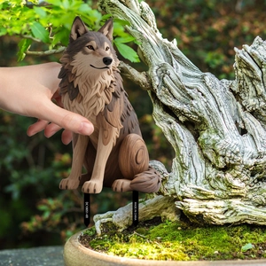 Detail of cartoon wolf garden stake featuring textured fur finish and sturdy ground spikes