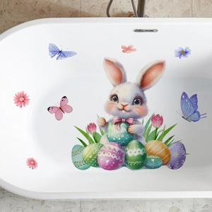 Détail d'autocollants lapin de Pâques et œufs colorés sur une baignoire blanche