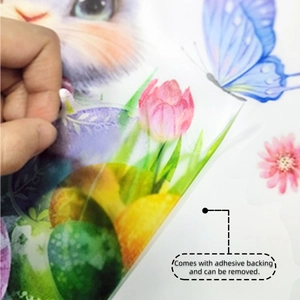 Détail montrant le support adhésif facile à décoller du sticker mural chat de dessin animé