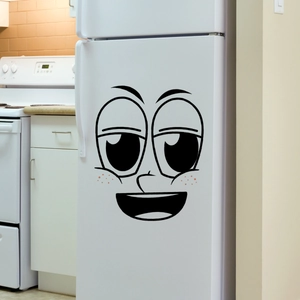 Zwarte grappige cartoon gezichtsstickers op een moderne witte keuken koelkast decoratie