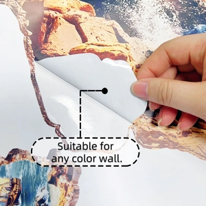 Detail showing the 3D sailing ship wall sticker being applied to a colored background