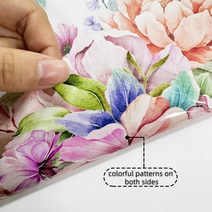 Detail of floral window sticker showing colorful flower patterns printed on both sides