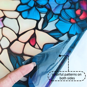 Close-up of double-sided colorful floral stained glass window film with matte texture