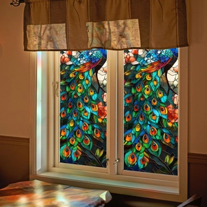 Detailed stained glass style window film featuring peacock feathers and floral patterns