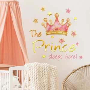 Sticker mural couronne aquarelle rose avec texte doré The Prince sleeps here pour chambre