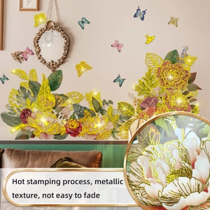 Detailed view of floral wall decals featuring hot stamping metallic texture and butterflies