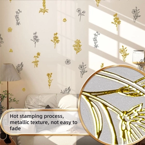 Detail of hot stamping gold leaf wall stickers with textured metallic finish on home wall
