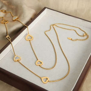 Elegant 18k gold plated hollow heart necklace with zircon stones on a box chain