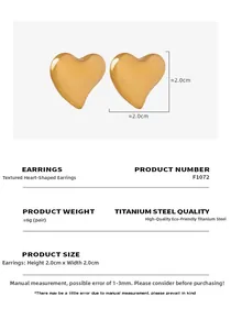 Detailed view of gold titanium steel heart earrings with size and weight specifications