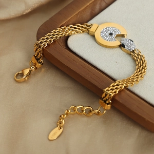 Bracelet luxe français plaqué or 18 carats avec tête de serpent, diamants et motif rond