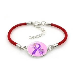 Braided red breast cancer awareness bracelet with pink ribbon charm on white background