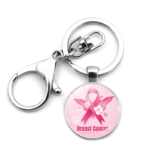 Detail of breast cancer awareness keychain with pink ribbon and floral charm design