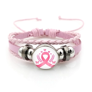 Detailed view of pink ribbon breast cancer awareness braided leather bracelet