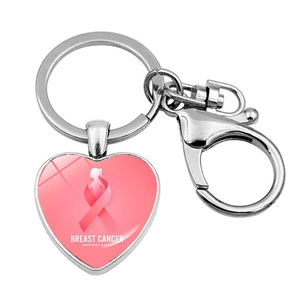 Close-up of heart-shaped keychain with Pink Ribbon and Breast Cancer Awareness text