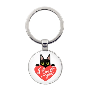 Detailed view of silver heart black cat keychain with I Love You glass cabochon pendant