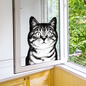 Realistic black and white cat window decal showing a tabby cat on a clear glass pane