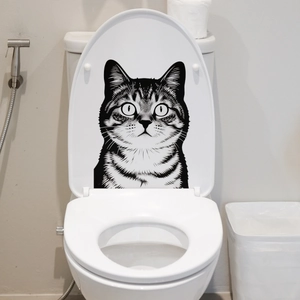 Waterproof realistic black and white cat portrait sticker applied on a white toilet lid