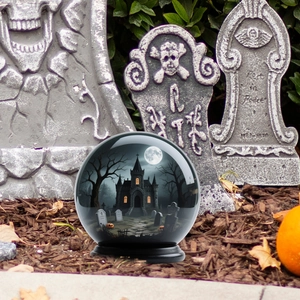 Halloween crystal ball garden stake with spooky miniature scene and black base
