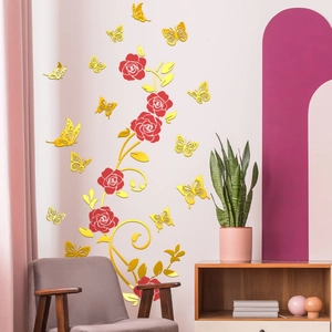 Golden 3D mirror wall sticker featuring floral rose patterns and hollow butterflies