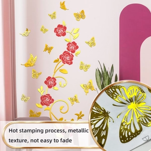 Detail of 3D gold hollow butterfly and red rose vine wall stickers with metallic texture