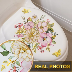 Blumen-WC-Aufkleber mit goldener Schmetterlingsprägung auf weißem Deckel