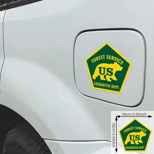Magnetic Sasquatch Dept forest service car sticker on a white vehicle gas tank cover