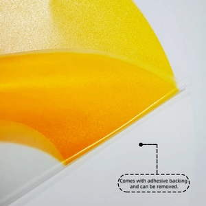 Detailed close-up showing the removable adhesive backing on translucent yellow film