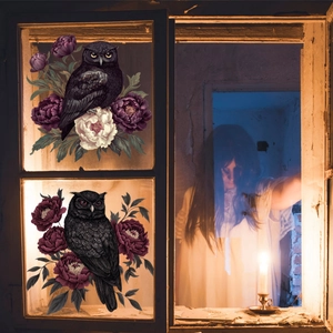 Detail of gothic window decals featuring black owls and peonies for Halloween decor