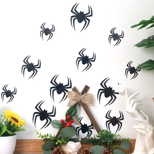 Detail of 3D black spider wall stickers with realistic textures for Halloween home decor