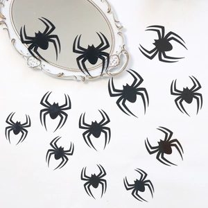 Detailed view of 12 black 3D spider wall stickers for Halloween decor on a white background