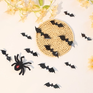 Detailed set of 3D glitter bats and plush spider for Halloween wall decoration