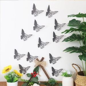 Set of 12 grey glitter butterfly wall stickers with intricate hollow carvings for home decor