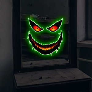 Adesivo murale mostro di Halloween luminoso con sorriso verde e occhi rossi