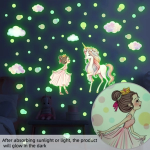 Luminous unicorn and girl wall stickers glowing green in a dark bedroom setting