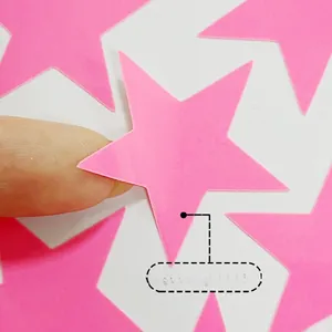 Close-up of a pink glow-in-the-dark star wall sticker showing texture and thickness
