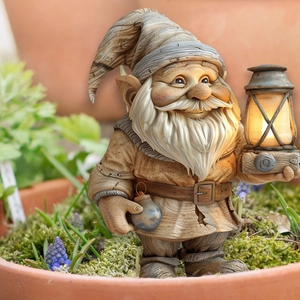 Detailed view of garden gnome statue with a warm lantern and moss-covered flower pot decor