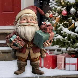 3D style Santa Claus garden stake decoration holding gift boxes in snowy yard