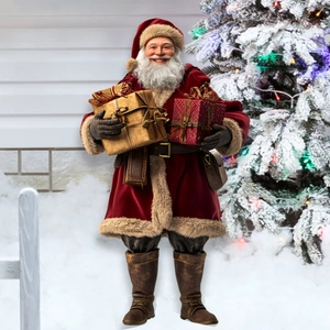 Close-up of Santa Claus garden stake in red velvet suit holding gift boxes in snow
