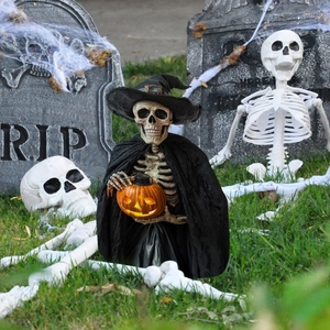 Halloween skeleton garden stake with witch hat and glowing pumpkin light decor