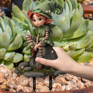 Detailed view of 3D cartoon forest elf girl garden stake decorative ornament