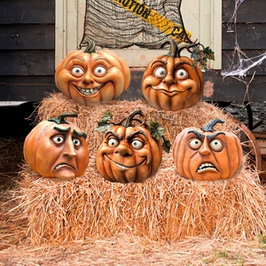 Set of 5 expressive pumpkin garden stakes with unique facial carvings for Halloween decor