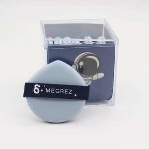 Detail of tear-drop makeup sponge with velvet texture and acrylic storage box