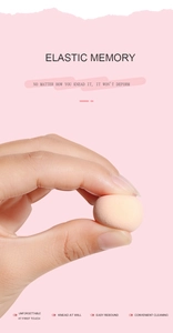 Close-up of pink makeup sponge showing high elasticity and soft texture detail
