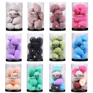 Multi-colored 10-piece mini makeup sponge sets in clear snowflake patterned cylinders