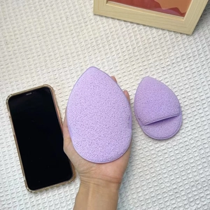 Set spugnette viola a goccia per pulizia viso e applicazione trucco professionale
